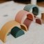 PETITE&MARS Silicone folding toy Rainbow Intense Ocher 12m+